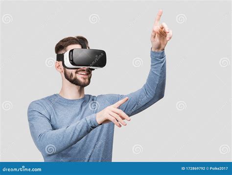 Young Man Experiencing Virtual Reality Eyeglasses Headset Handsome Men