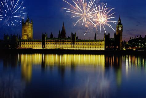 Fireworks exploding over the Houses of Parliament and the river Thames, London, England posters ...