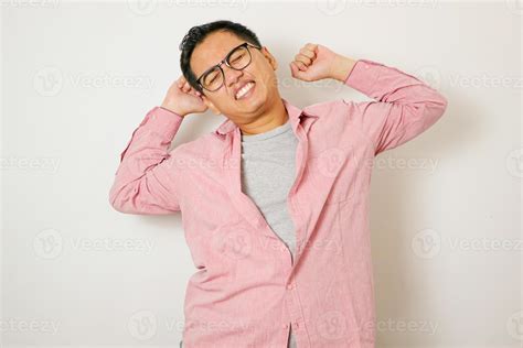 Spine problems. Portrait of young asian man in casual white t-shirt