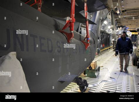 Ground Crews Prepare To Unload A Us Army Uh 60 Black Hawk Helicopter