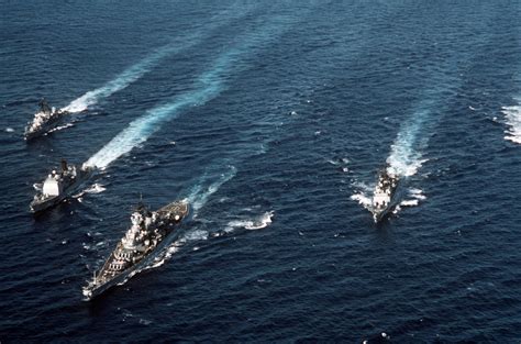 An Aerial Port Bow View Of The Battleship Uss Iowa Bb Battle Group