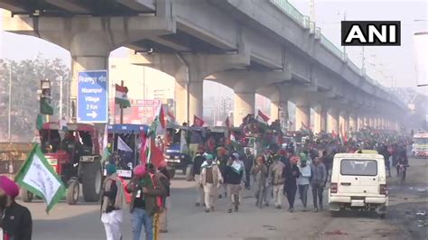 Farmers Break Police Barricade At Tikri Border Tractor Rally Enters Delhi