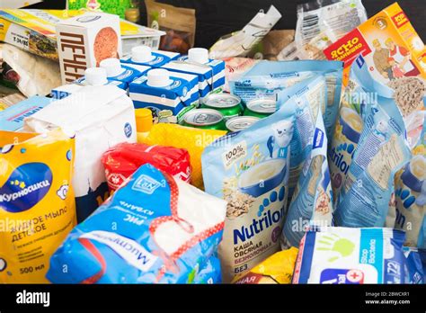 Saint Petersburg, Russia - March 26, 2020: Different products on table ...