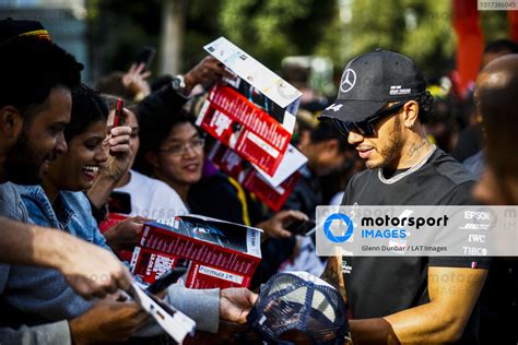 Lewis Hamilton Mercedes Amg F Signs An Autograph For A Fan At The