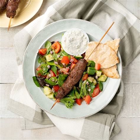 Middle Eastern Inspired Koftas With Tomato Salad And Feta Yogurt Sauce