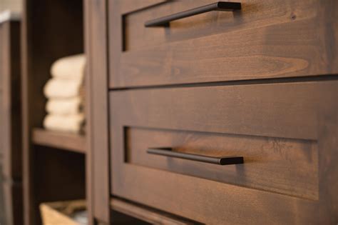 Knotty Alder Master Bathroom Cabinetry Close Up With Dark Cabinet