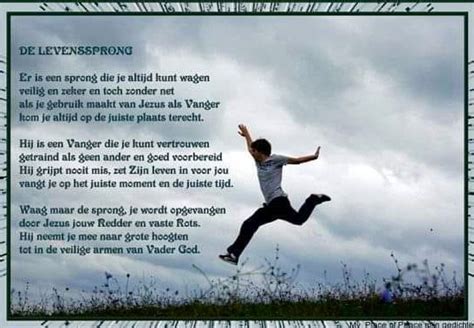 A Man Jumping Up In The Air On Top Of A Grass Covered Field With A Poem