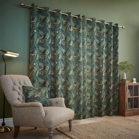 Moorland Green Eyelet Curtains | Dunelm