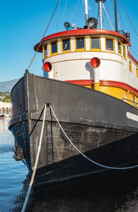 Old Tugboat In A Sunny Summer Day Tug Boats Are Working In A Harbor