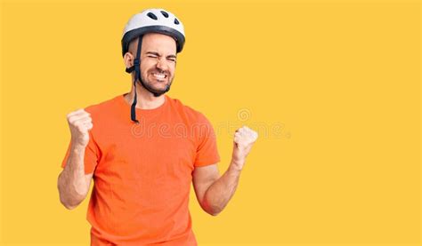 Young Handsome Man Wearing Bike Helmet Very Happy And Excited Doing