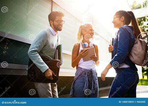 Group Of Friends Studying Together At University Campus Stock Image