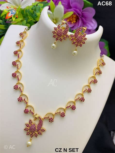 Pin By Godavari On Polki Pearl Ruby Chain Indian Jewelry Sets Temple