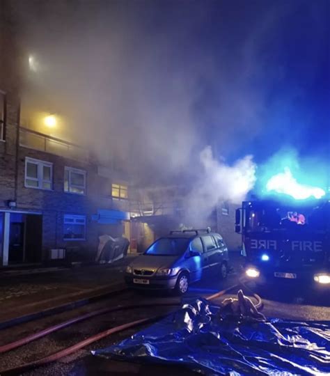 Firefighters Wearing Breathing Apparatus Rescued Eight People And Two