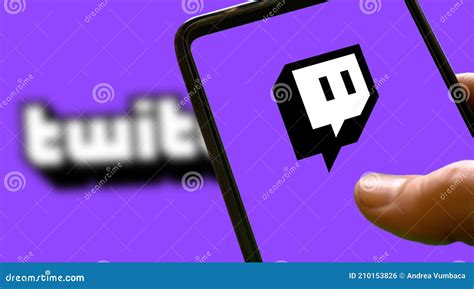 Purple Twitch Logo On A Smartphone Screen With Purple Background And