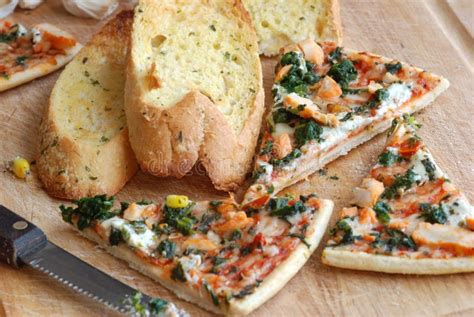 Pizza with garlic bread stock photo. Image of bake, slice - 15860720