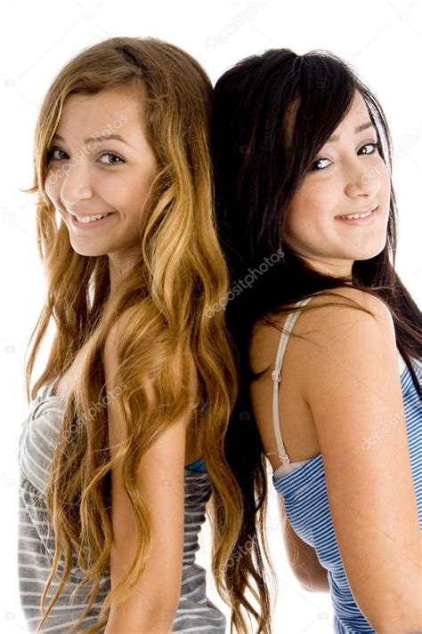 Young Sisters Back To Back Stock Photo By ©imagerymajestic 1672592