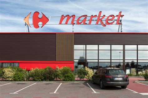 Supermarché Carrefour Market à Villers Bocage Exo architectes