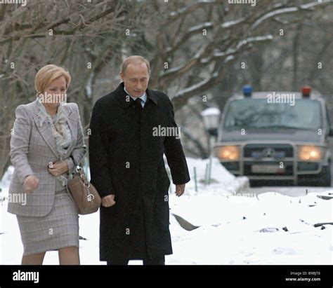 Russian President Vladimir Putin And His Wife Lyudmila On Their Way To