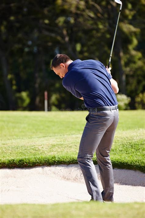 Practice Makes Perfect A Handsome Mature Man Playing A Game Of Golf Stock Image Image Of