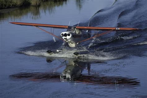 Float plane Landing Photograph by LW Pittman - Pixels