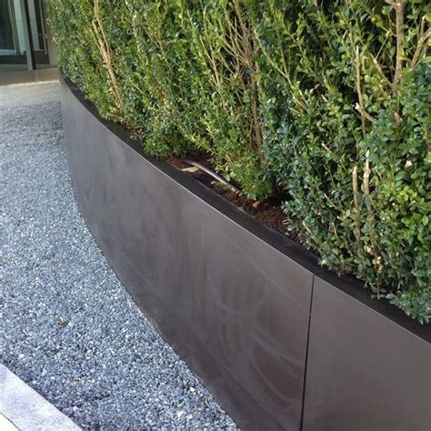 Curved Sloping Steel Planters For Luxury Development Outdoor Design Esi External Works