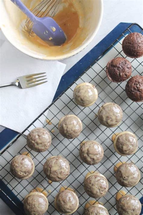 Baked Chocolate Doughnut Holes With Peanut Butter Glaze The Spiffy Cookie