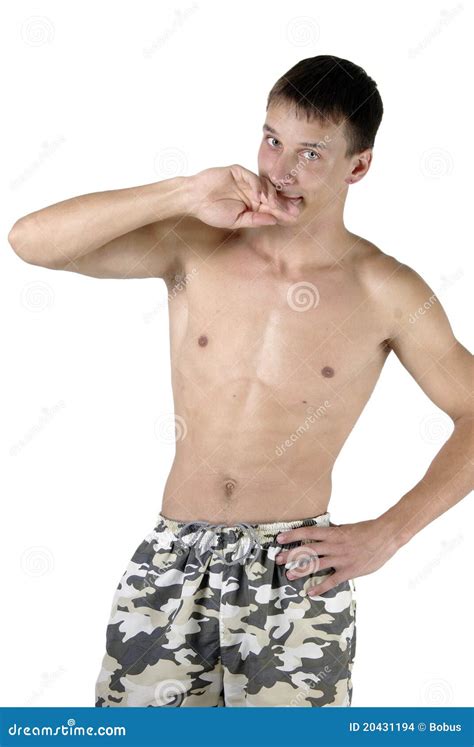Athletic Guy With Naked Torso Raised Arms Performing Dance On Blue Studio Background Copy Space