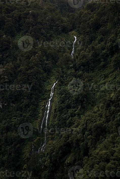 waterfall hidden in the forest 3445704 Stock Photo at Vecteezy