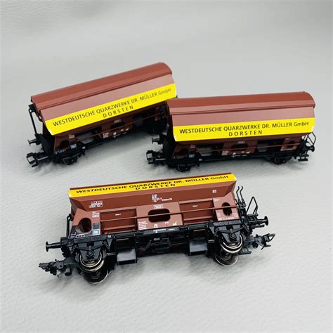 Coffret de 3 wagons à toit pivotant Tdgs DB Ep IV MARKLIN 46335