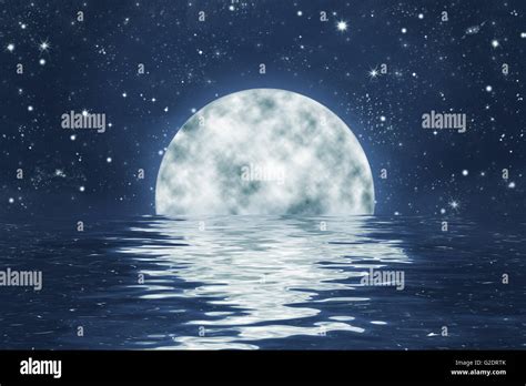 Moon Set Over Water With Waves With Full Moon On Blue Night Sky With