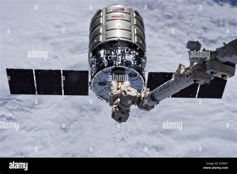 The Orbital Sciences Cygnus Cargo Spacecraft Docks With The