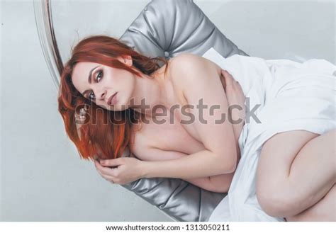 Beautiful Nude Woman Lying On Gray Stock Photo 1313050211 Shutterstock