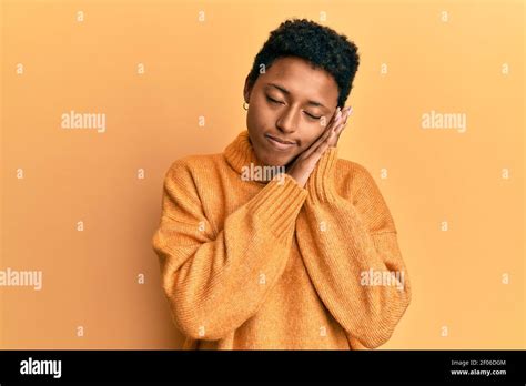 Young African American Girl Wearing Casual Clothes Sleeping Tired