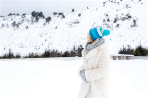 Premium Photo Portrait Of Happy Beautiful Blonde Woman With Snow In
