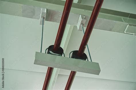 Installation Of Chilled Water Pipes Under The Building Beam Stock Photo