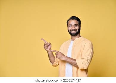 82 Indian Business Man Looking Pointing Fingers Hand Gesture Aside