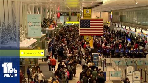 Some Travelers Keep Positivity Amid Long Lines At Bwi Marshall Youtube