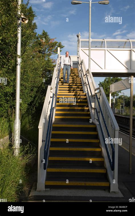 Steps Leading To Passenger Bridge Over Railway Line Stock Photo Alamy