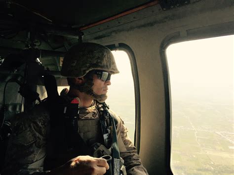 Marine recognized for bravery after helicopter crash that killed two airmen