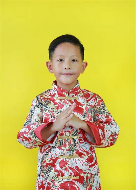 Happy Asian Girl Child In Traditional Thai Costume Dress With Showing