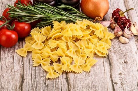 Premium Photo Raw Italian Durum Wheat Farfalle Pasta For Cooking