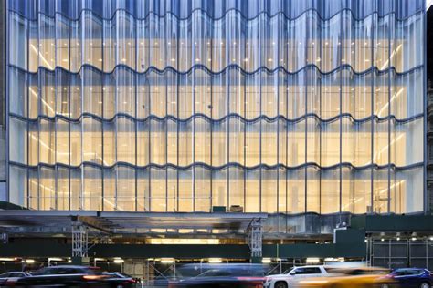 James Carpenter Design Associates Lets The Light Into Nordstrom With Gargantuan Double Curved