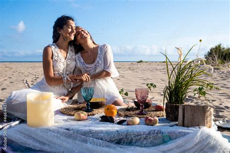 Happy Lesbian Couple Holding Hands On Beach Stock Photo Adobe Stock
