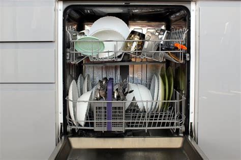 There are Clean Dishes in the Dishwasher Stock Image - Image of built, cutlery: 195304115