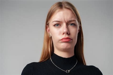 Premium Photo Young Woman In Black Shirt Expressing Discontent