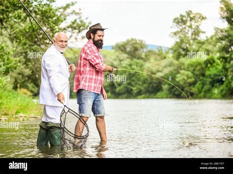 Gone Fishing Hobby Of Businessman Retirement Fishery Retired Dad And Mature Bearded Son