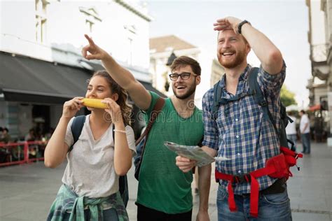 Happy Group Of Tourists Traveling And Sightseeing Stock Photo Image