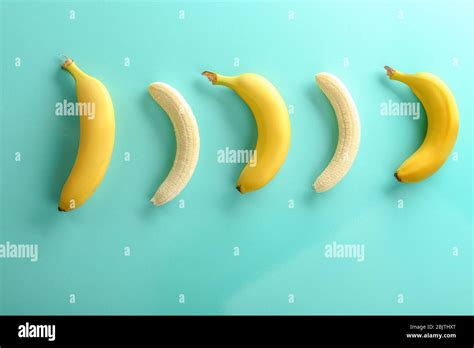 Ripe Bananas On Color Background Stock Photo Alamy