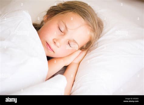 Adorable Little Girl Sleeping In The Bed Stock Photo Alamy