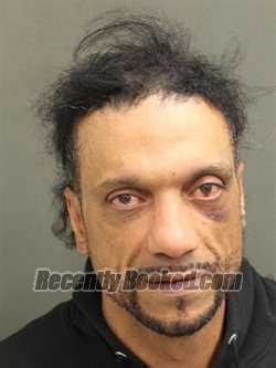 Recent Booking Mugshot For HECTOR JAVIER RIVERA In Orange County Florida